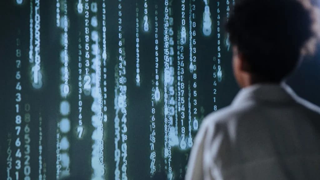Person viewing AI data on a digital screen